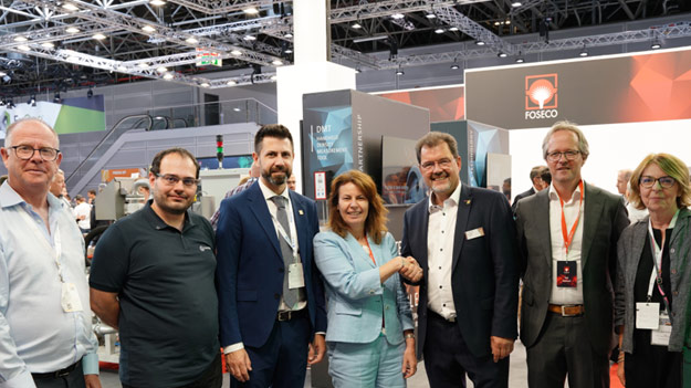 Seven people at GIFA 2023 event, celebrating the Lifetime Legacy sponsorship agreement between Foseco and WFO. Pictured (left to right): Eur. Ing. Andrew Turner (Executive Secretary, WFO), Lionel Alves (Executive Member, WFO), José Javier González (General Secretary, WFO), Karena Cancilleri (President, Foseco), Dr. Carsten Kuhlgatz (President, WFO), Rob Welland (Vice President Marketing & Technology, Foseco), and Lynn Postle (Editor, Foundry Trade Journal), with a Foseco booth in the background.