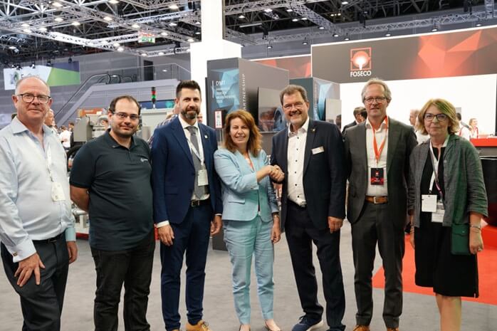 Seven people at GIFA 2023 event, celebrating the Lifetime Legacy sponsorship agreement between Foseco and WFO. Pictured (left to right): Eur. Ing. Andrew Turner (Executive Secretary, WFO), Lionel Alves (Executive Member, WFO), Jos&eacute; Javier Gonz&aacute;lez (General Secretary, WFO), Karena Cancilleri (President, Foseco), Dr. Carsten Kuhlgatz (President, WFO), Rob Welland (Vice President Marketing & Technology, Foseco), and Lynn Postle (Editor, Foundry Trade Journal), with a Foseco booth in the background.